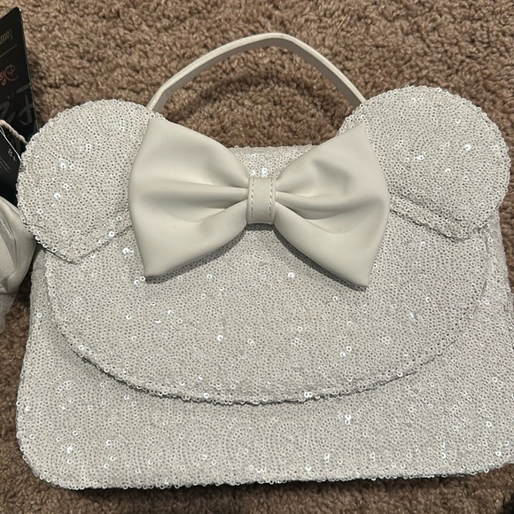 Loungefly Handbags - Loungefly Disney sequin bag with exchangeable bow.